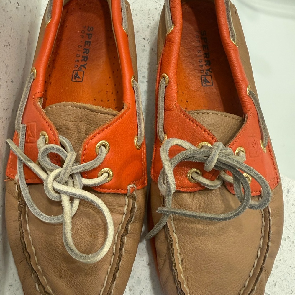 Sperry Women’s Vibrant Orange and Tan Boat Shoes.